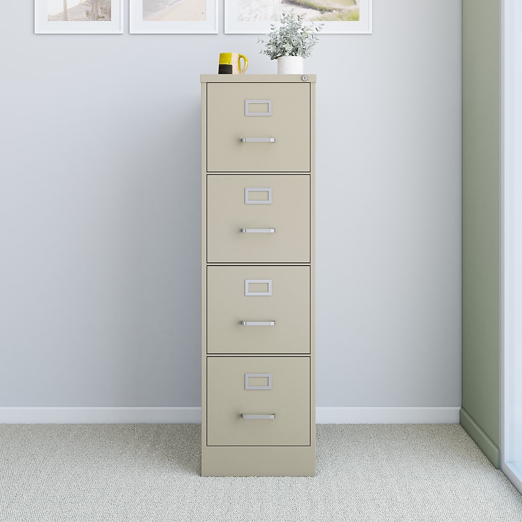 Tall beige filing cabinet in small office setting