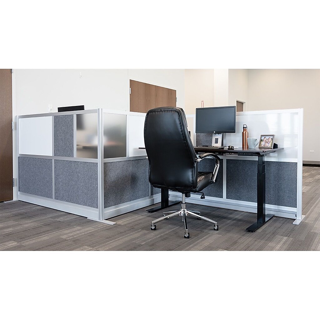 Office cubicle with white top panels and gray fabric lower panels