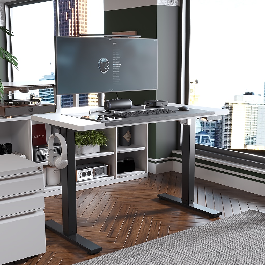 Desk setup in an urban modern office with monitor and accessories