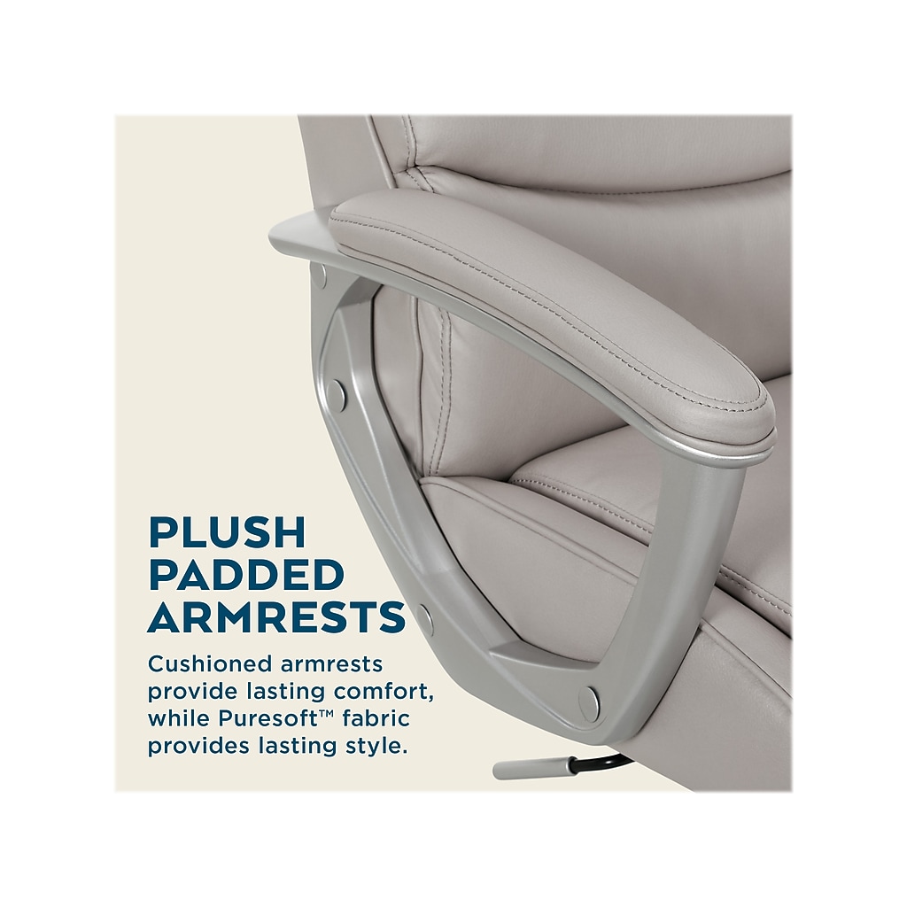 Close-up of cushioned armrest with plush padding