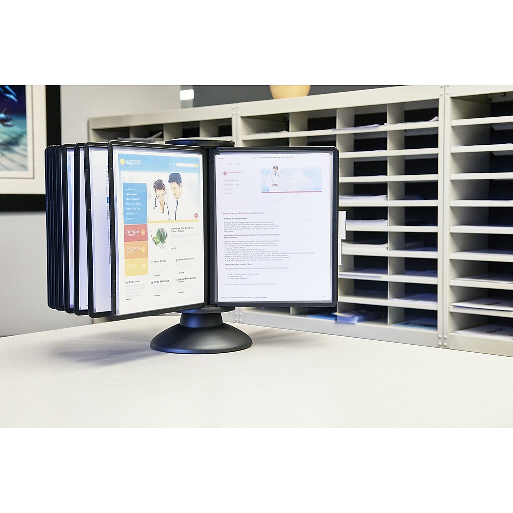 Document holder on desk in office with shelves behind