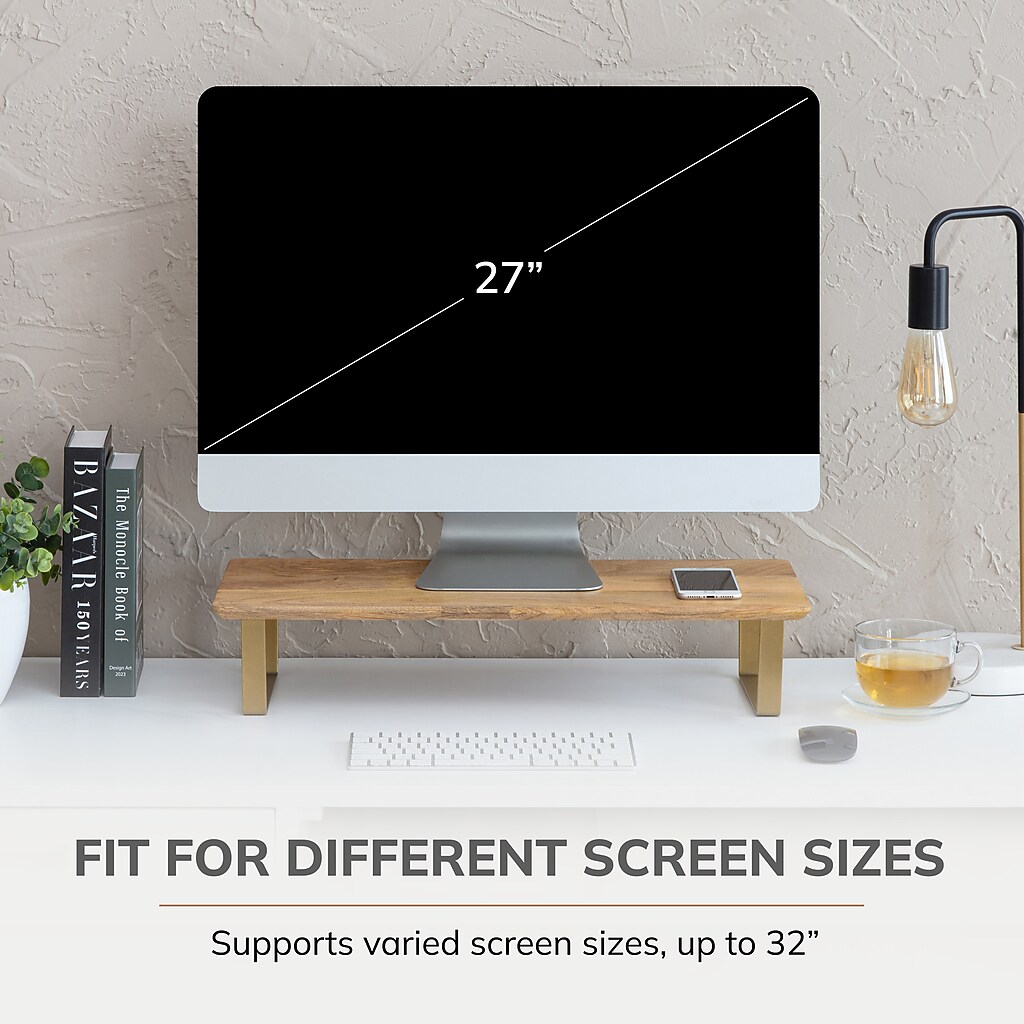 27 inch monitor on a wooden stand with accessories