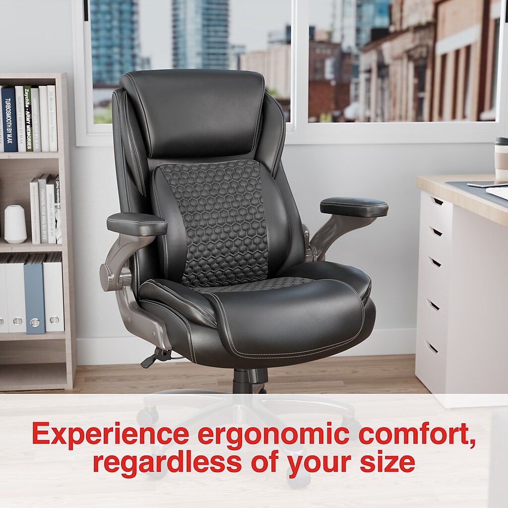 Ergonomic black chair in home office with desk