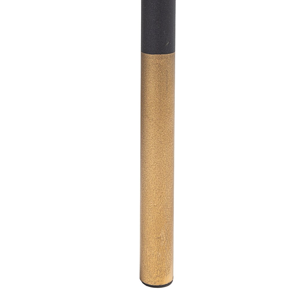 Close-up of one leg with black finish and gold tip