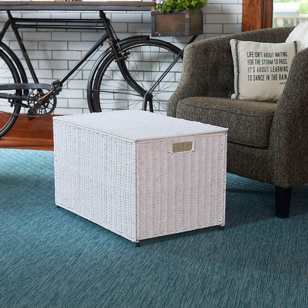 White wicker storage chest in a living room scene