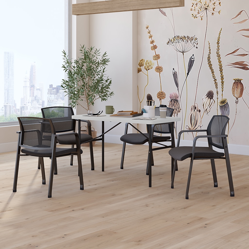 Small group seating around a white folding table in a modern room