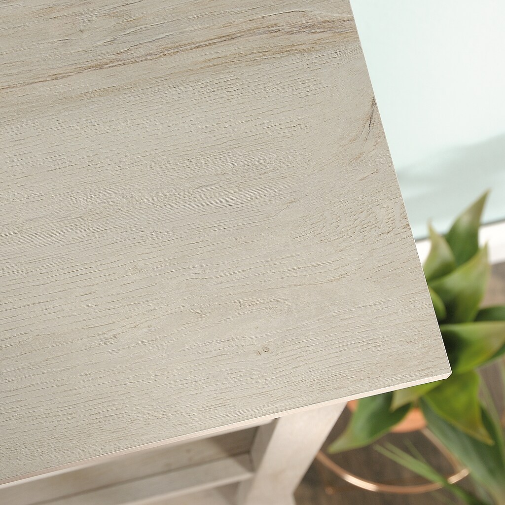 Close-up of edge of shelf showing wood grain