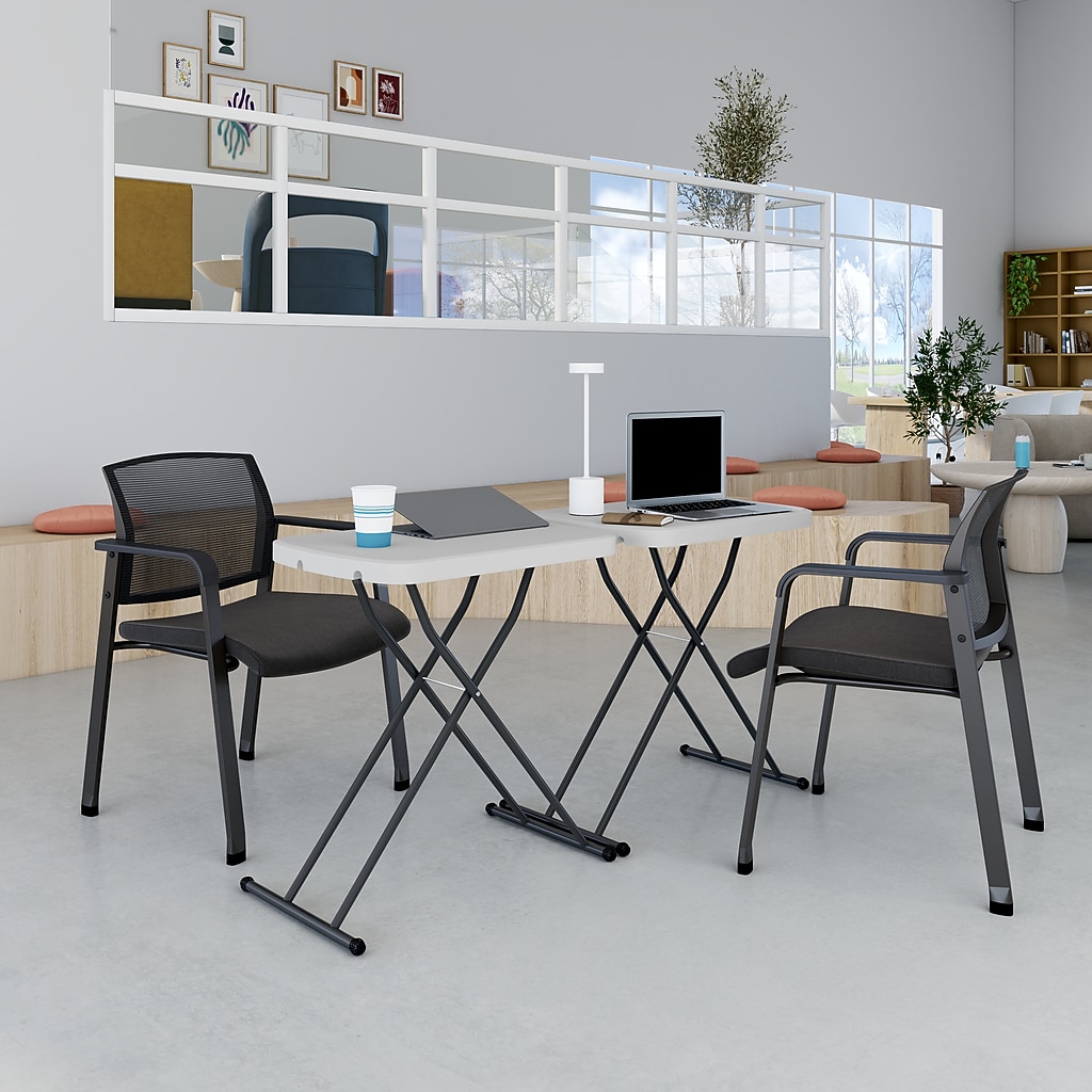 Office space with folding table and chairs