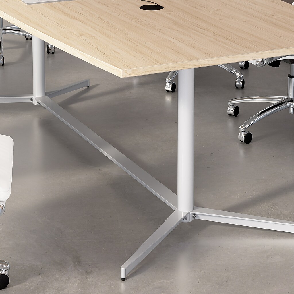 Close-up of table leg and base with grey metal frame