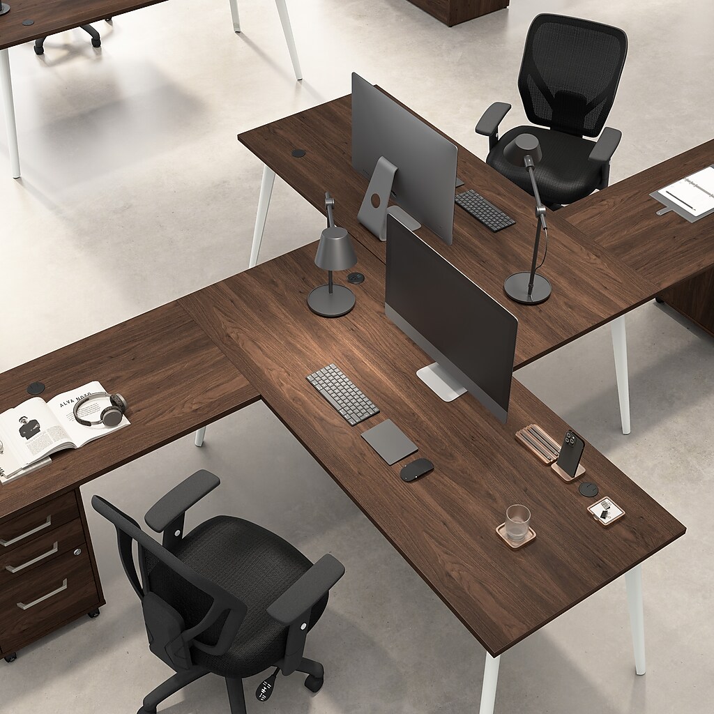 Office desk with multiple workstations and chairs