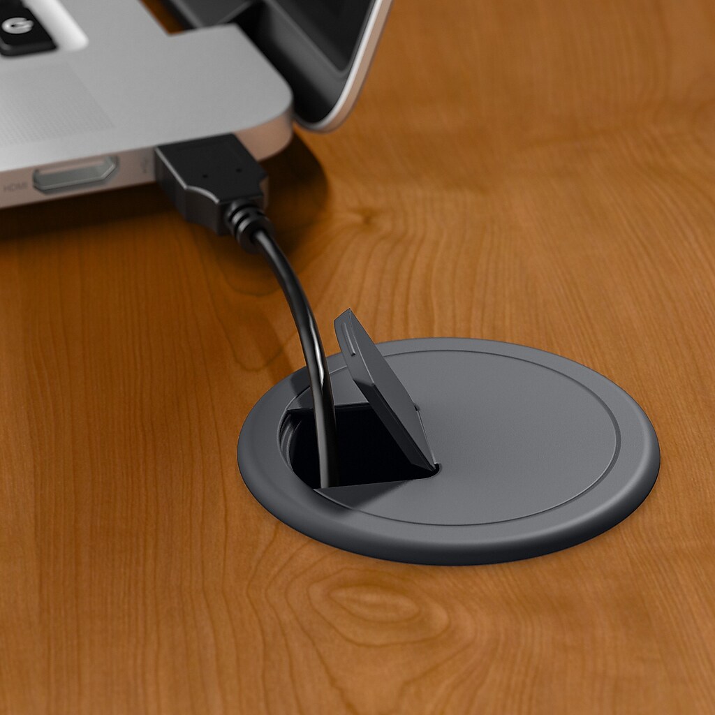 Desk cable management grommet and charger connection