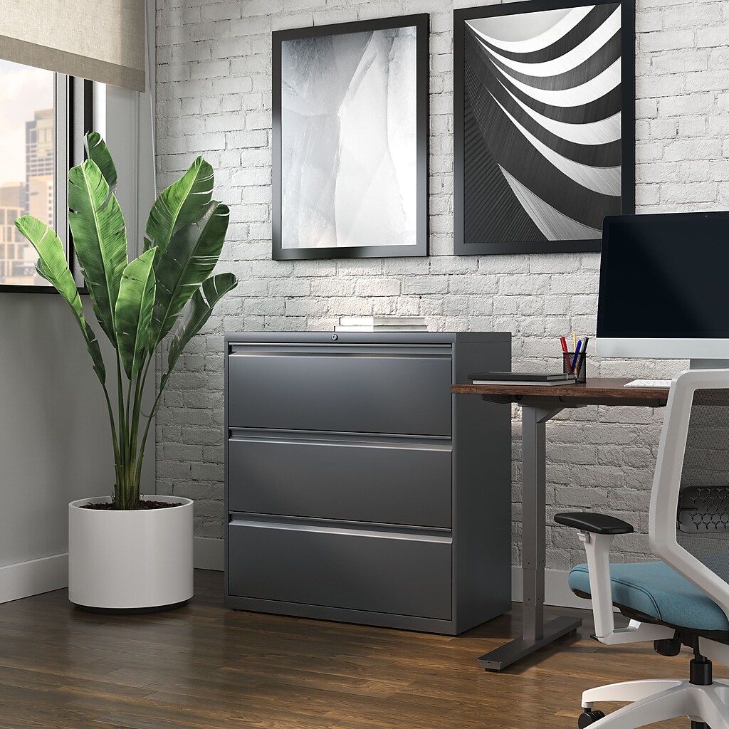 3-drawer cabinet in office setting with desk