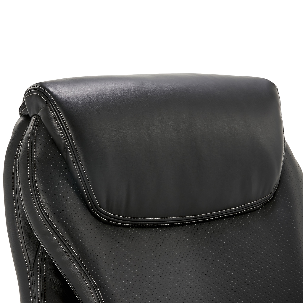 Close-up of chair upper back and head area