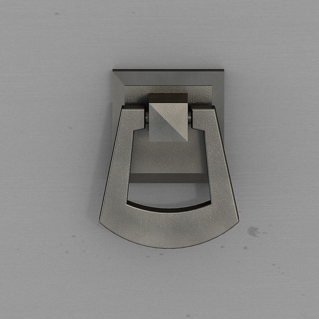 Close-up of metal latch/handle on cabinet door