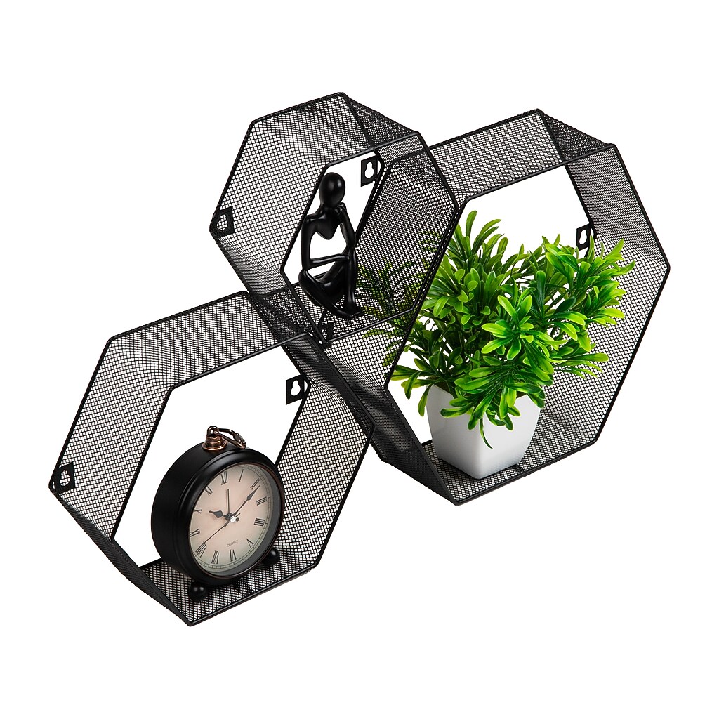 Close-up of hexagonal metal mesh shelf containing a clock and figurine