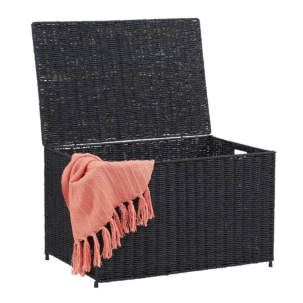 Open lid with pink throw resting on chest