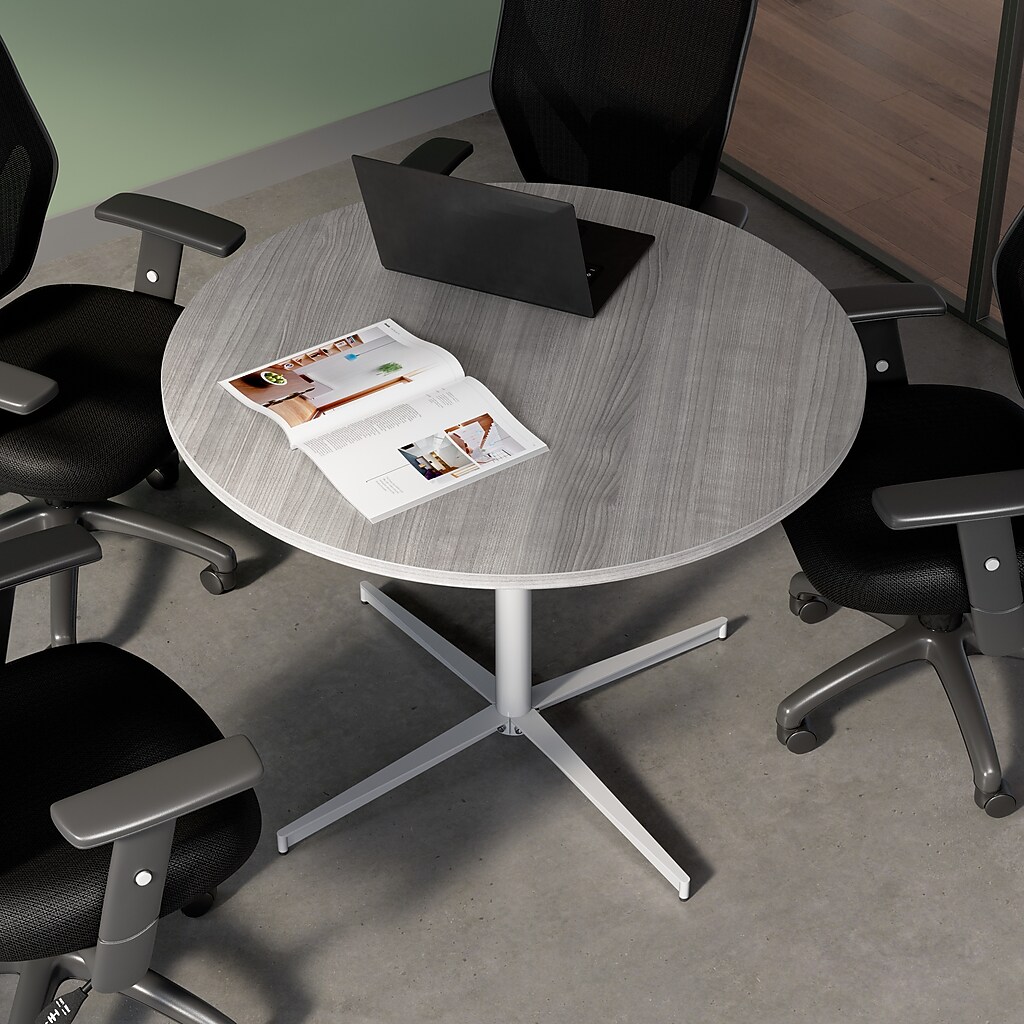 Round conference table seen from above in an office