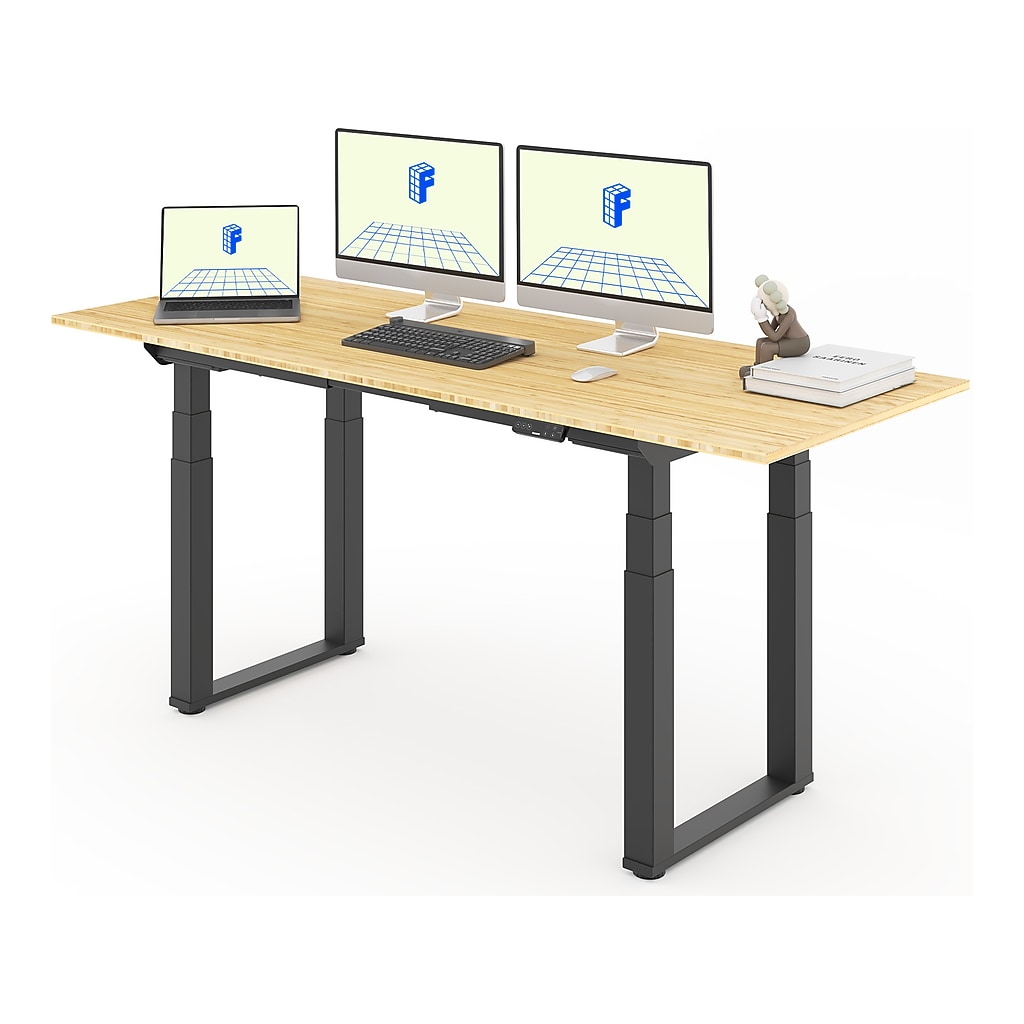 Desk used as an office workspace with multiple monitors and keyboard