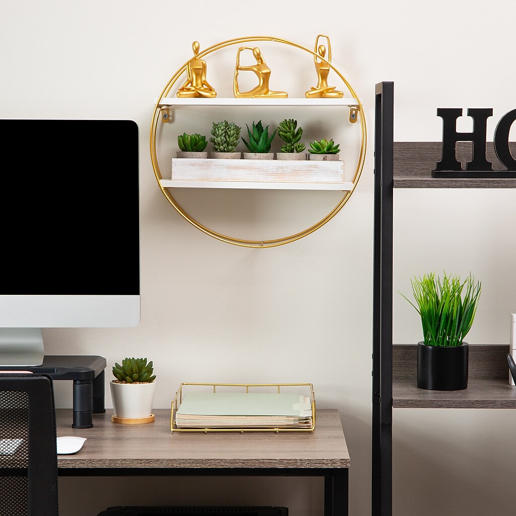 Round gold shelf with top figurines on display in a room