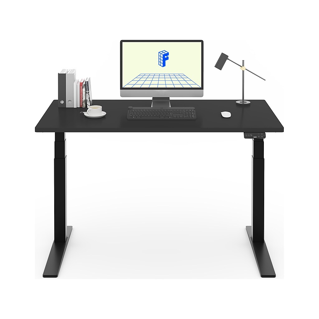 Desktop setup with keyboard, monitor, and accessories on desk
