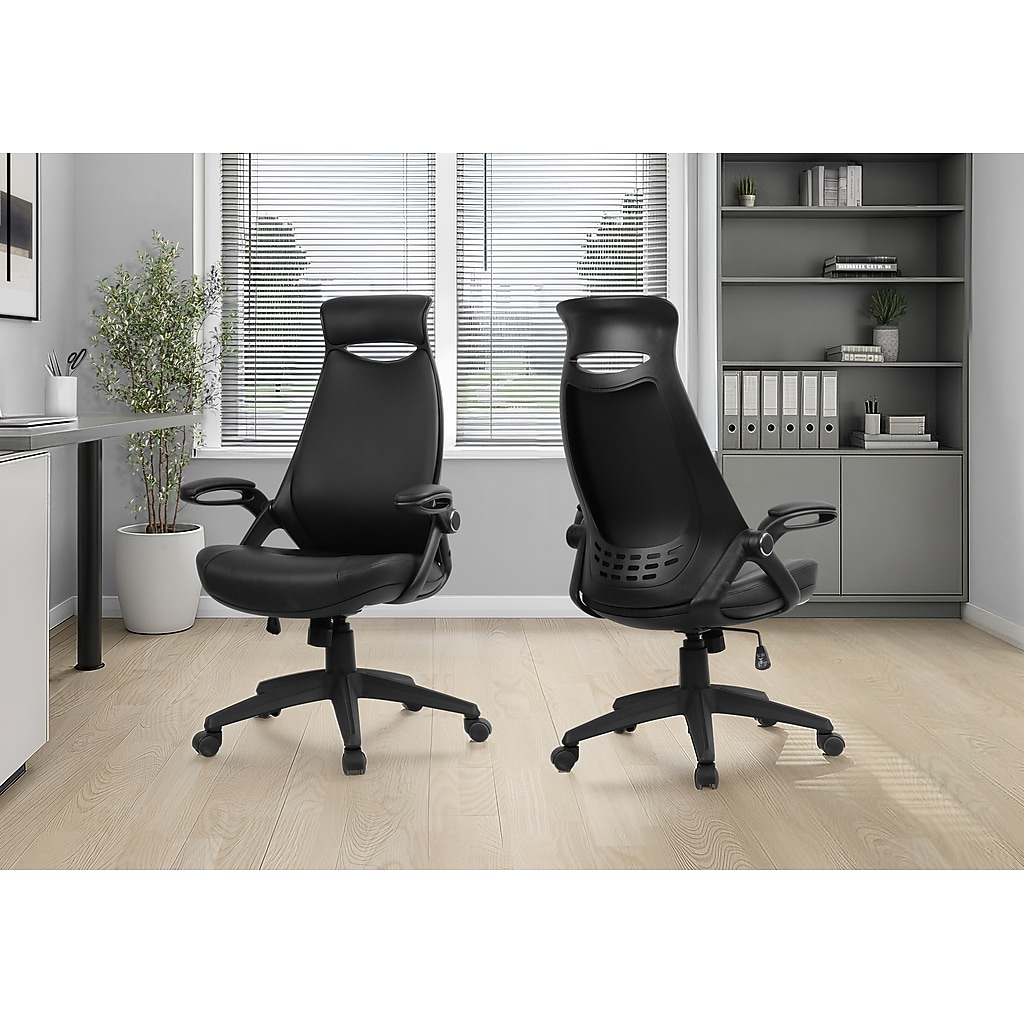 Two black ergonomic office chairs in a modern office setting