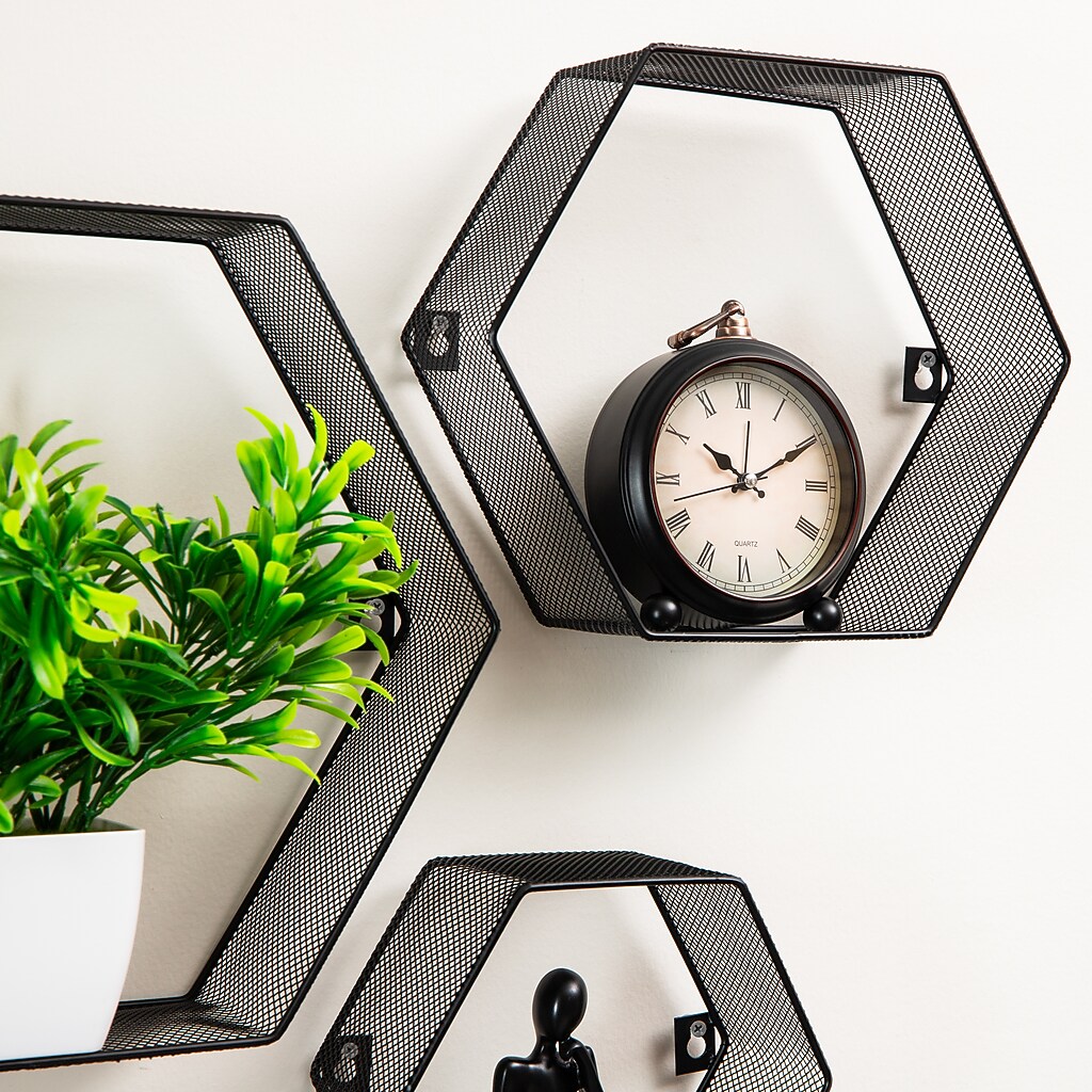 Close-up of hexagonal shelf with plant on left and full mesh structure visible
