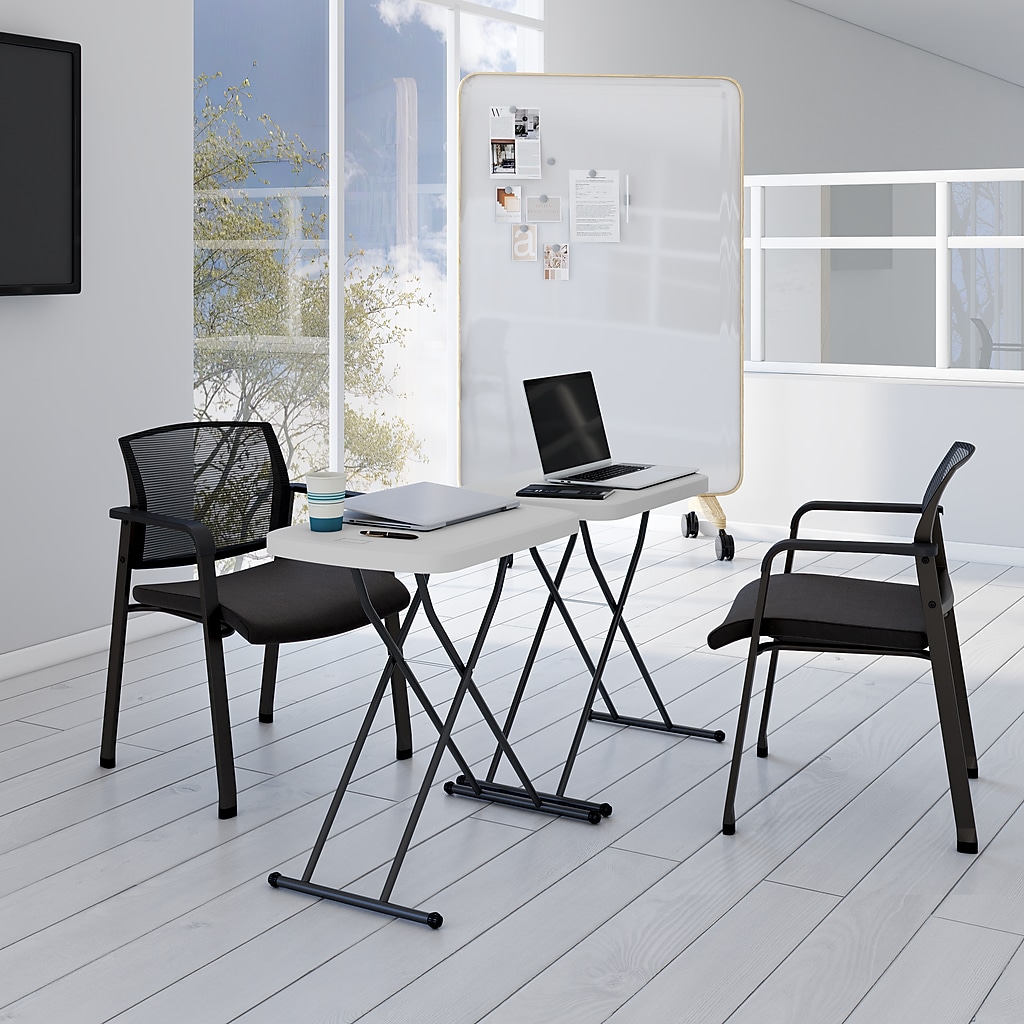 Office/workspace with folding table and laptop