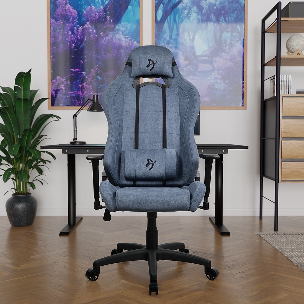 Blue Arozzi Torretta ergonomic racing chair in a home office setup