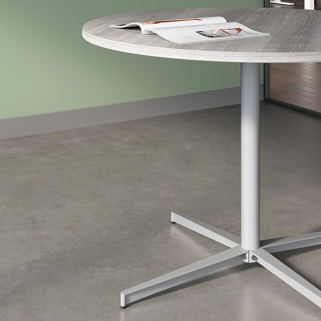 Close-up of round conference table pedestal and base