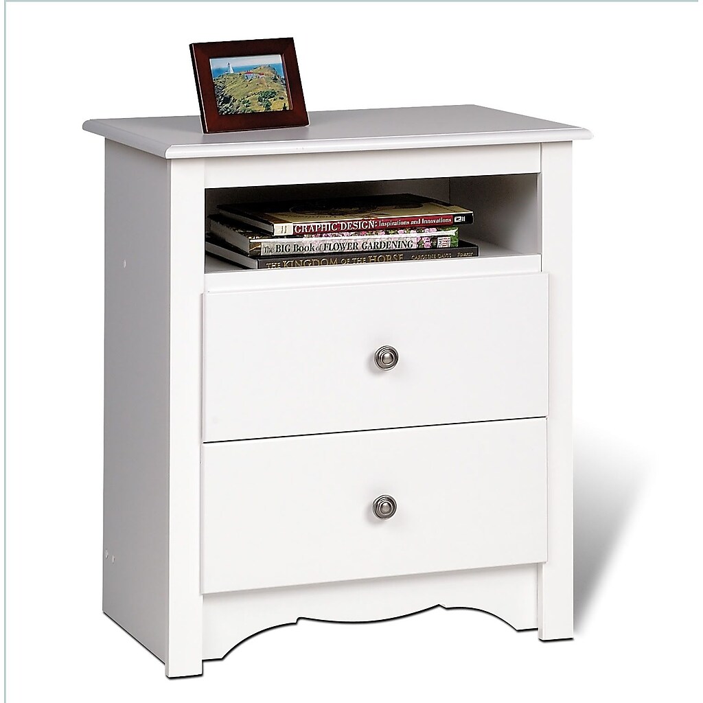 Nightstand with open shelf and stacked books on top