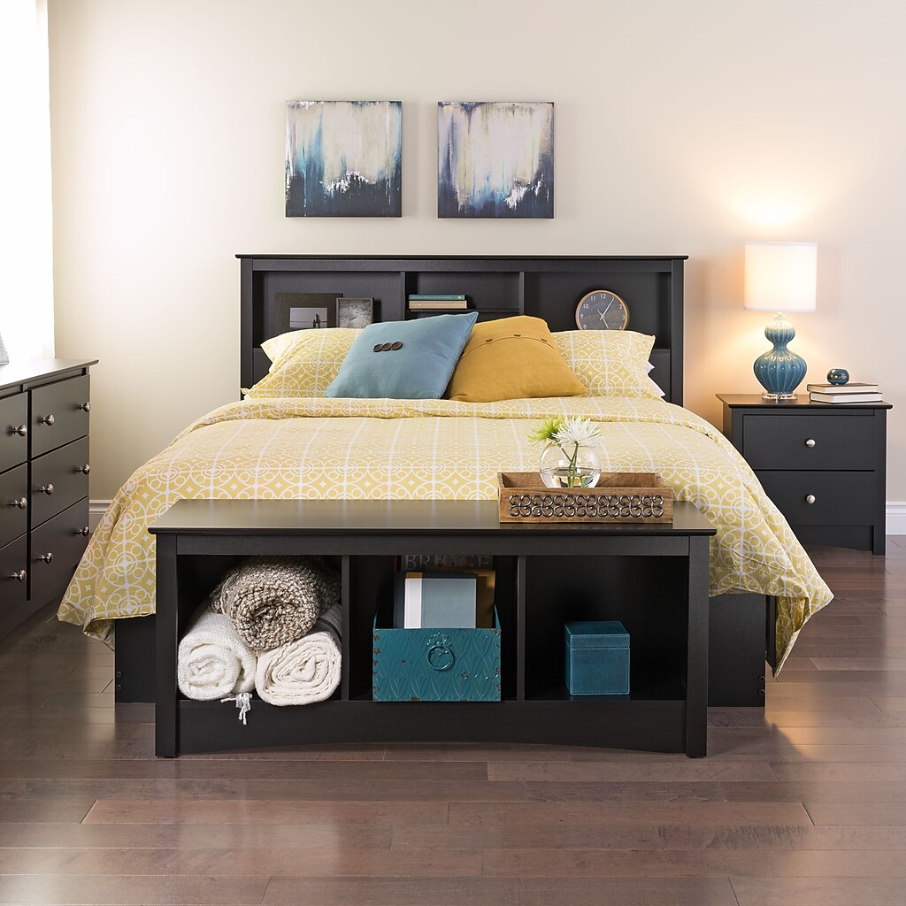 Bedroom set with nightstands and bench at foot of bed