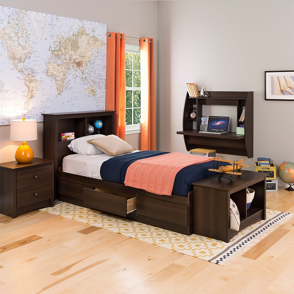 Bedroom setup with bed, nightstand and wall-mounted desk in dark wood finish