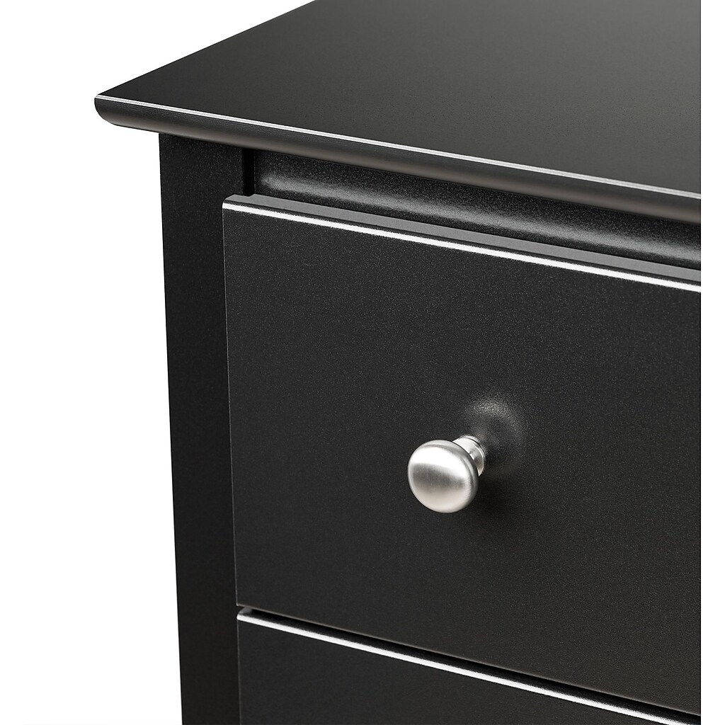 Close-up of drawer front with silver knob