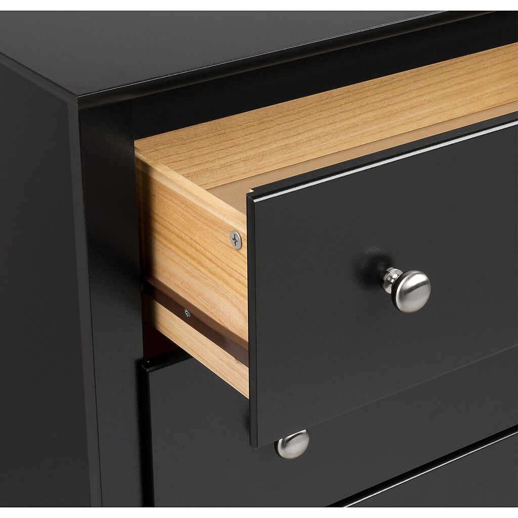 Drawer open showing light wood interior