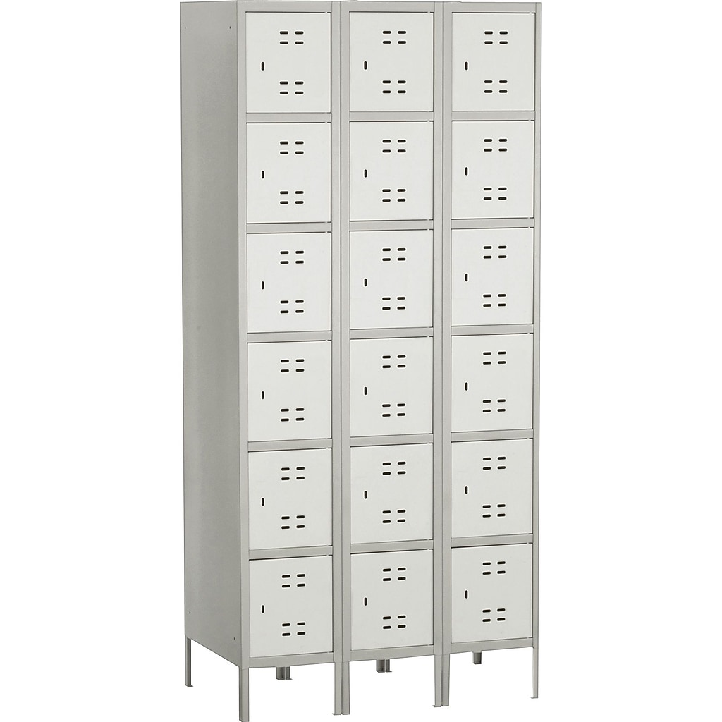 Tall gray metal storage lockers with multiple small doors arranged in three columns