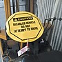 Accuform 24" Steering Wheel Message Cover "CAUTION THIS VEHICLE IS BEING..", Black On Yellow (KDD738)~#|#~s0810204_sc7