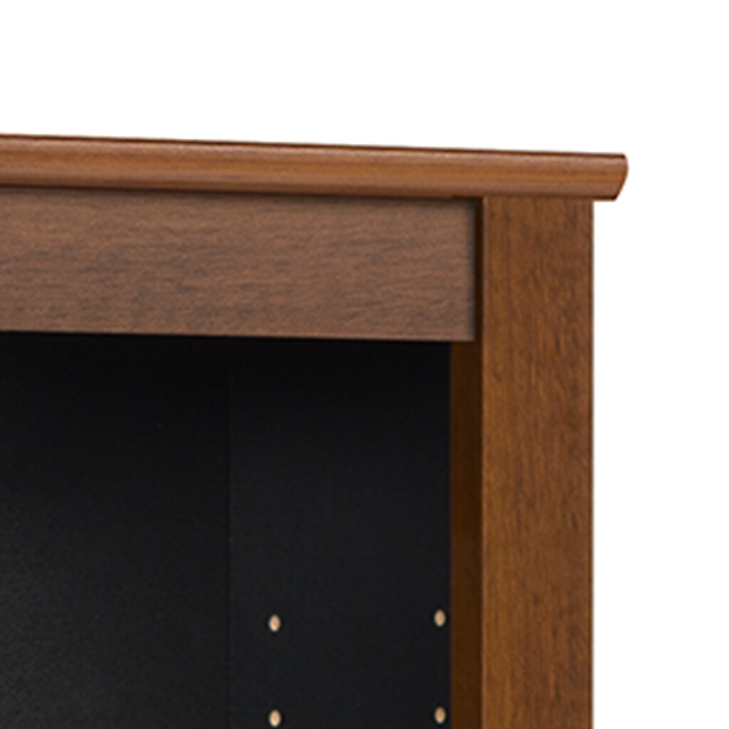 Top corner of the storage cabinet showing wood finish