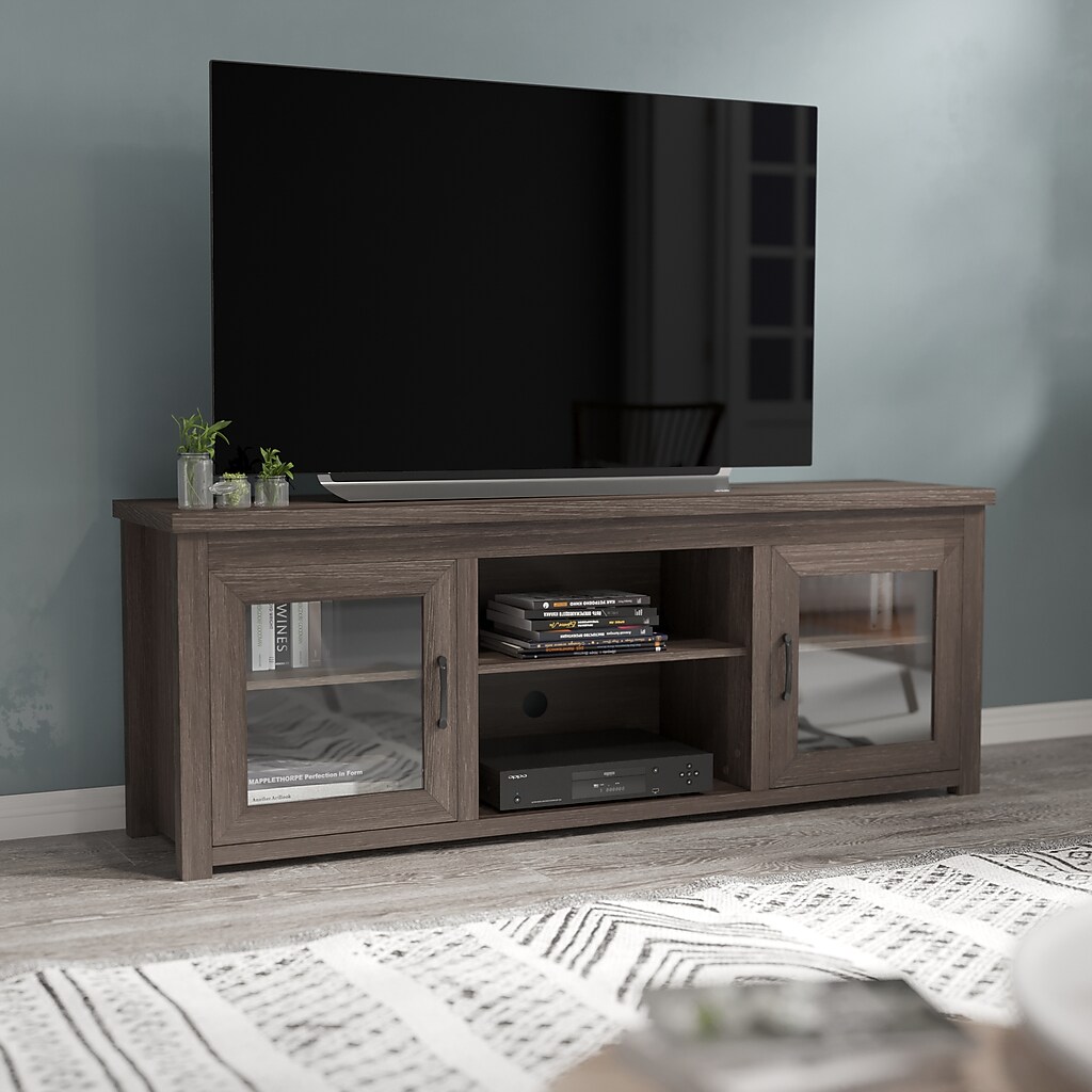 TV stand with TV on top, open central shelf