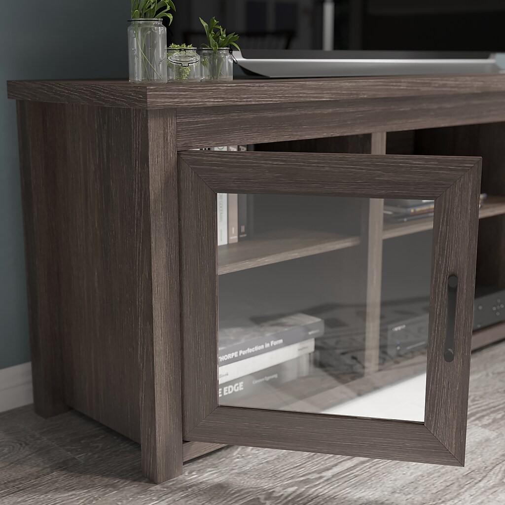 Close-up of glass-front cabinet showing wood frame